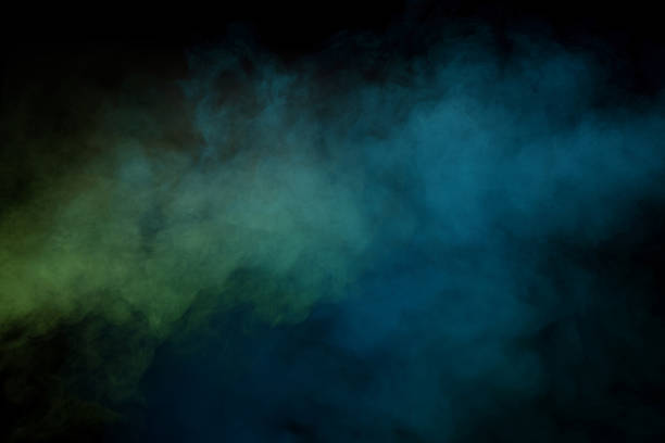 istock Green and white steam on a black background. 2249396714