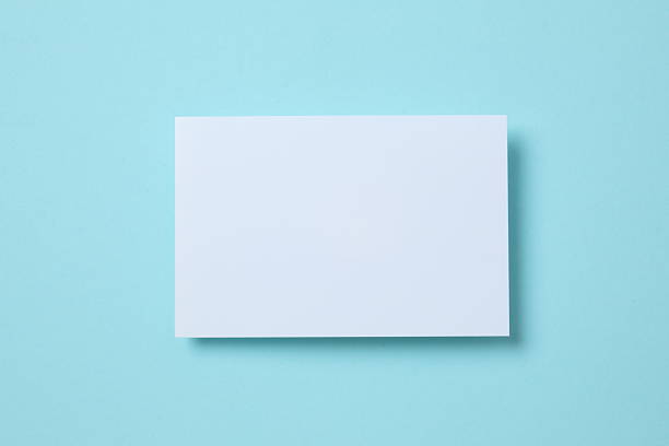 istock Red paper card on color background 2249402402