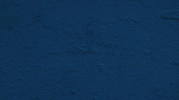 istock wall is a deep blue color and has  textured surface.  texture gives  wall  unique and interesting appearance 2249402955