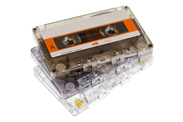 istock Stack of retro audio cassettes isolated on white background 2249404947