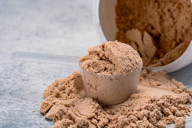 istock Chocolate whey protein. Supportive nutrition for muscle building 2249406936