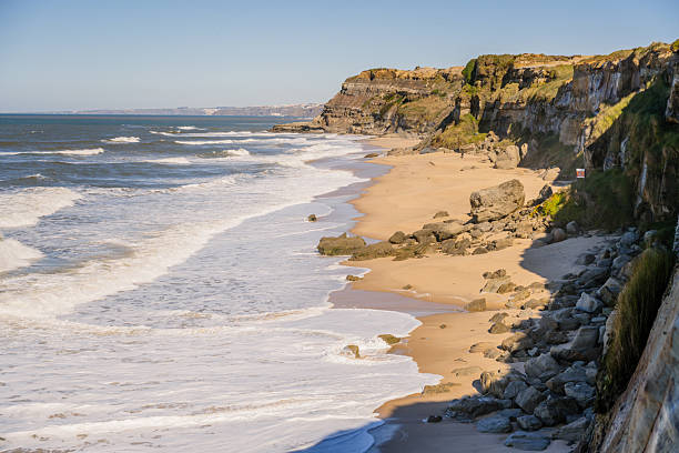 istock Wide view of Atlantic beach and rugged cliffs 2249409714