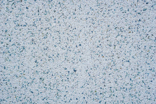 istock light blue-grey terrazzo texture closeup with small colorful embedded stone chips showing speckled pattern concept of construction material, architecture, flooring 2249410162