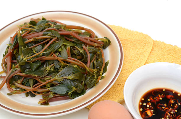 Special purslane vegetable meal on white