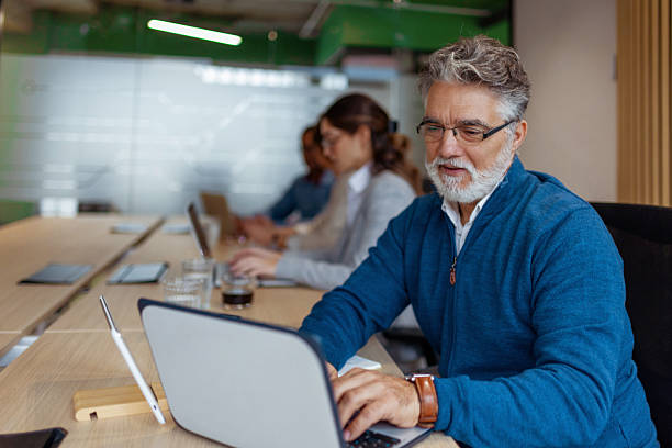 istock Mature Professional in Smart Casual Attire at Work 2249417003