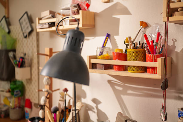 istock Various tools and materials for clay sculpting are neatly organized on shelves and containers. Illuminated by a lamp in a workshop setting. Creating a cozy and inspiring atmosphere for creative work 2249419206