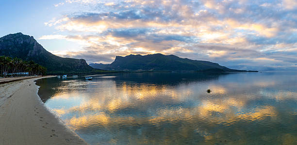 istock Le Morne Bay at sunrise with calm reflective waters, Mauritius 2249419464