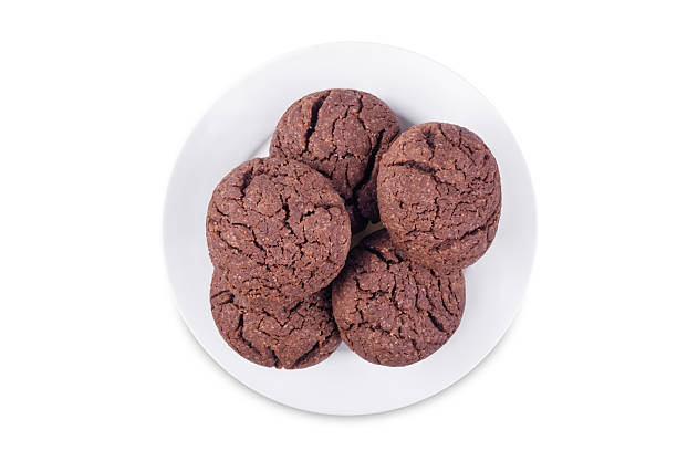istock Chocolate chip cookies in a plate on a white isolated background 2249429656