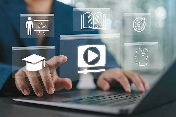istock Concept of Online Education. Man use Online education training and e-learning webinar on the internet for personal development and professional qualifications. Digital courses to develop new skills. 2249432606