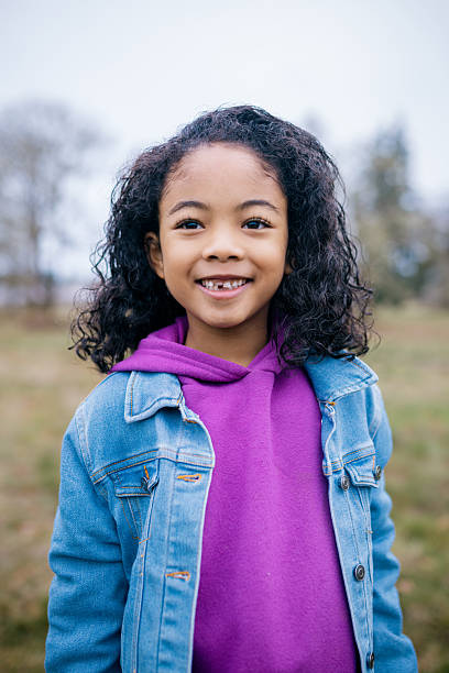 Cheerful Elementary Aged Girl Outdoors