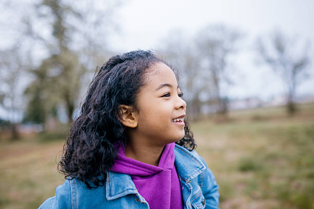 istock Cheerful Elementary Aged Girl Outdoors 2249434333