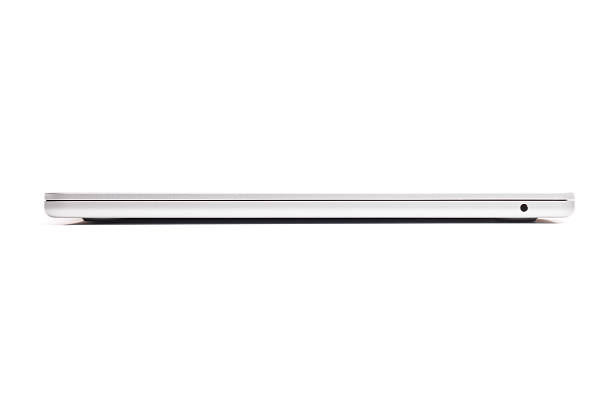 Ljubljana, Slovenia - December 1, 2025. An Apple MacBook Air laptop computer with 15.3-inch display, M4 chip, 10-Core CPU, 10-Core GPU, 24GB Unified Memory, 512GB SSD Storage, Silver color, Slovenian keyboard, isolated on white, HiRes photo taken by Canon R5.
