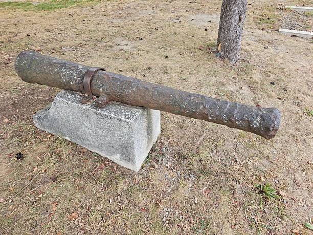 istock Very old rusty war cannon in historic display side view 2249436163