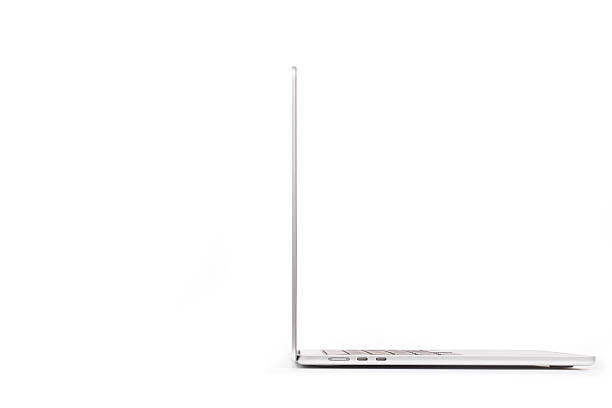 Ljubljana, Slovenia - December 1, 2025. An Apple MacBook Air laptop computer with 15.3-inch display, M4 chip, 10-Core CPU, 10-Core GPU, 24GB Unified Memory, 512GB SSD Storage, Silver color, Slovenian keyboard, isolated on white, HiRes photo taken by Canon R5.