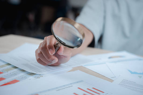 istock Digital Investigation with Magnifying Glass Hands-on Digital Search and Research Concept Focused Technology Exploration with Laptop 2249440820