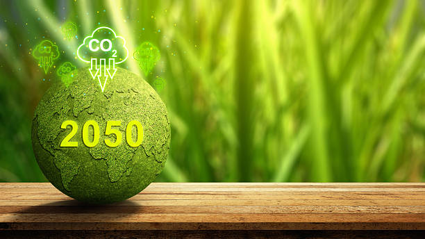 istock Green globe resembling Earth, with a focus on environmental issues and the reduction of CO2 emissions by the year 2050. Concept of Net Zero Emission 2249443504