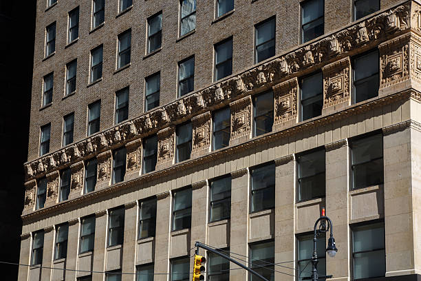 The Sixth avenue or avenue of the Americas and the  historic skyscraper Buildings of Midtown Manhattan, New York City, USA