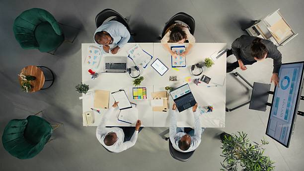 istock Top down view of diverse colleagues and managers participating in briefing 2249446214
