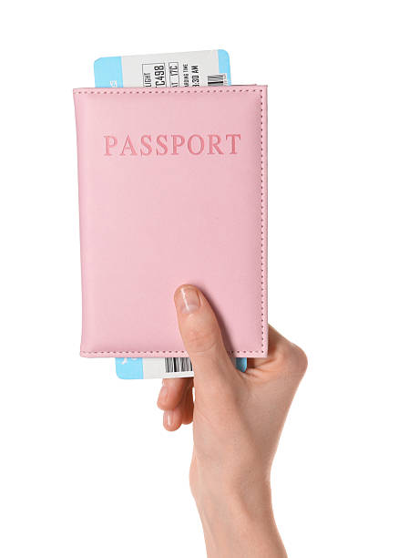 istock Woman holding passport with ticket on white background, closeup 2249446889