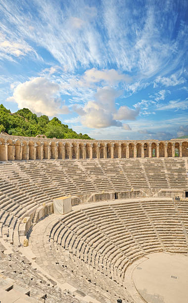 istock Ancient stone amphitheater at Aspendos ruins under a bright blue sky 2249447533