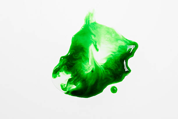 istock Fresh green liquid spill or splat with bubbles on a white background 2249447654