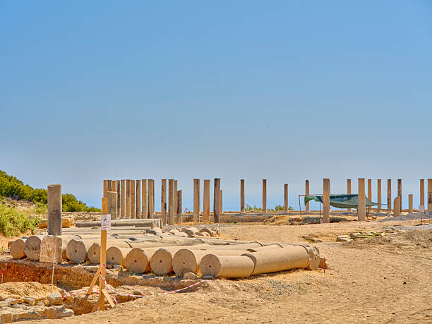 Stone arches and abutments of the Hadrianic aqueduct of Caesarea Maritima National Park along Israel's Mediterranean coast.