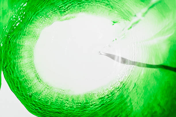 Abstract freshness green colored liquid surface. Circular wave shape. Water with ripples