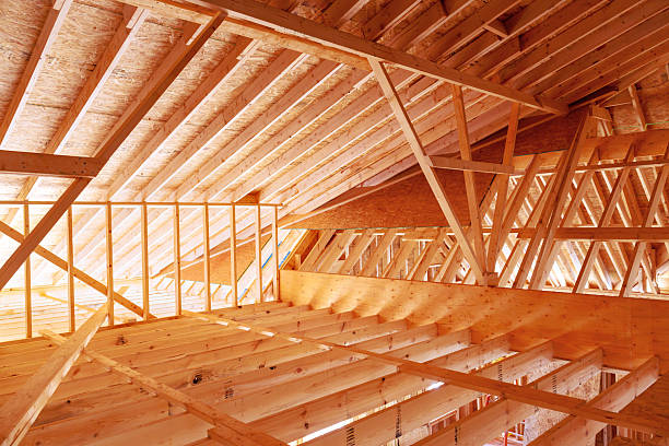 istock Renovation work wooden beams rafters in spacious attic area 2249452476