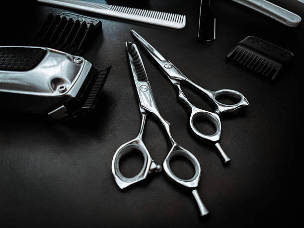 istock Haircut tools for men organized on dark background 2249454480