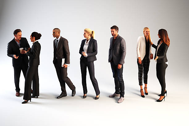 istock Diverse professionals in business attire standing together in a studio. 2249457068