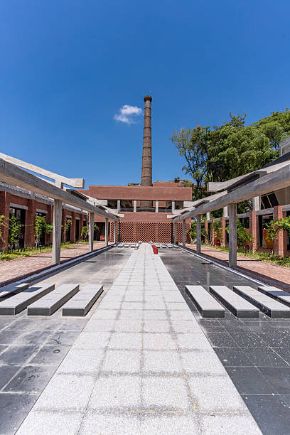 Chimneys and old red brick factory buildings