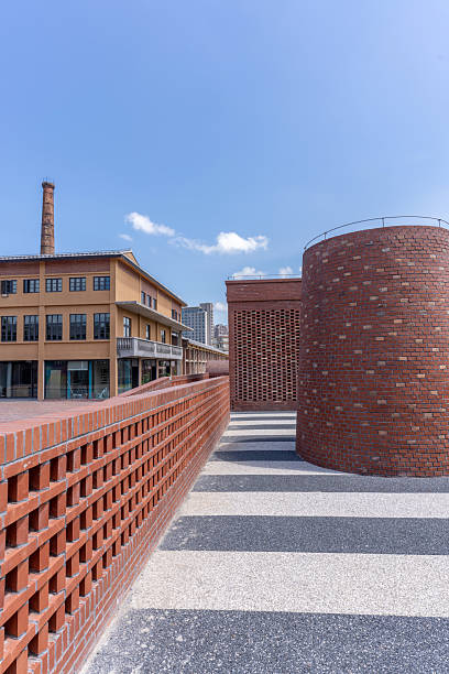 Chimneys and old red brick factory buildings