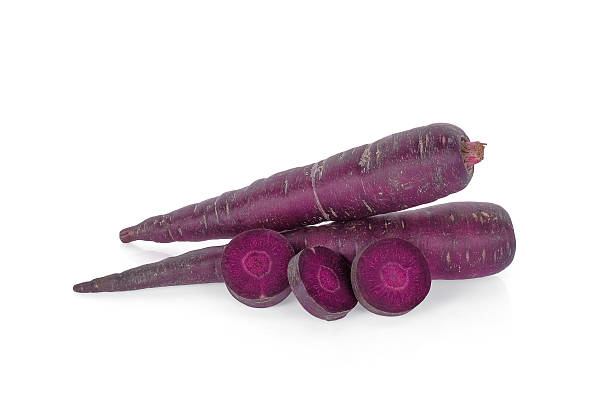 istock purple carrot isolated on white background 2249466363