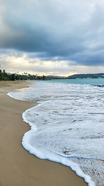 istock Luquillo beach in tropical Puerto Rico and white puffy clouds 2249468290
