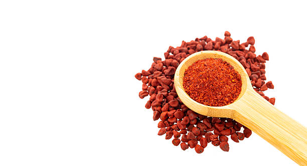 istock Crushed annatto seeds in the spoon - Bixa Orellana 2249473068
