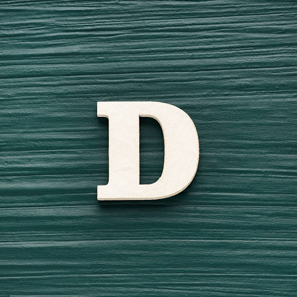 istock Capital letter D, White letter on a rustic dark green background 2249473305