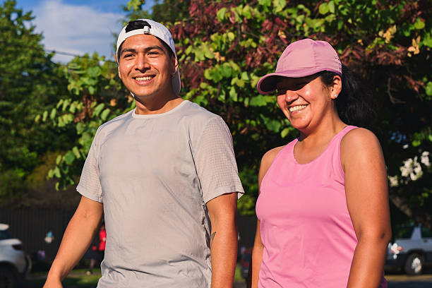 istock Happy couple running outdoors on a sunny day 2249473687