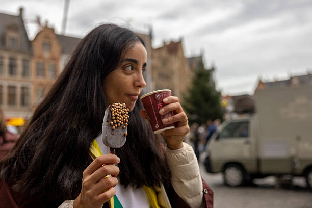 istock woman eating ice cream 2249473904