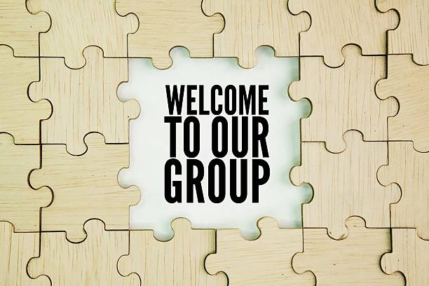 Wooden puzzle with the words welcome to our group