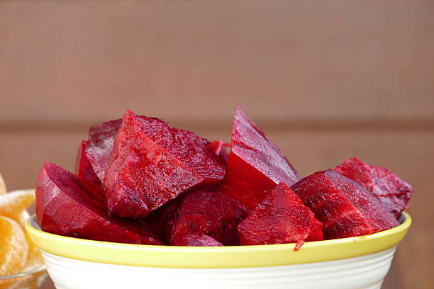 istock Slices of beetroot in a white bowl 2249492118