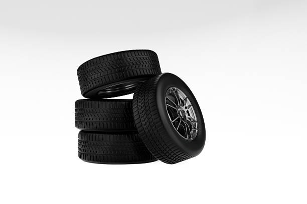 istock Stack of four glossy black automotive tires or wheels 2249493453