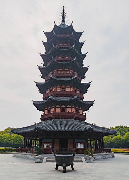 istock A multi-tiered pagoda rises majestically with intricate wooden architecture, surrounded by lush greenery. Panmen Scenic Area in Suzhou, China. 2249494388