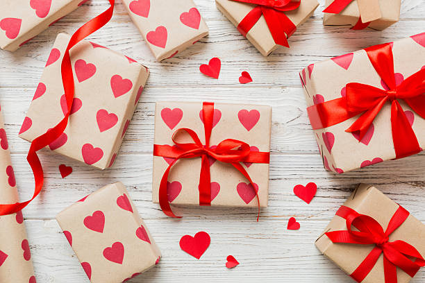istock Creative gift box with decorations for the holiday, top view. Birthday and valentine present 2249495603