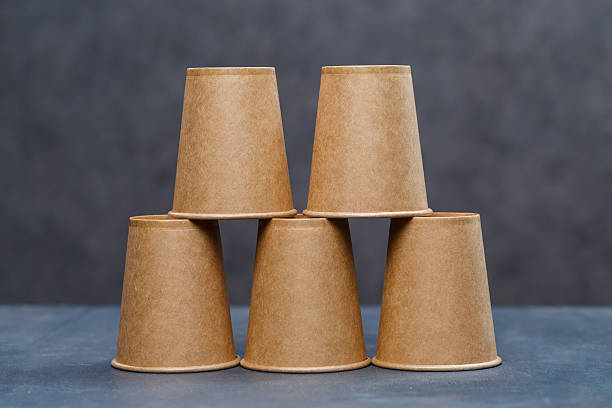 istock Paper cups for drinking, dishes. Disposable cardboard dishes made from environmentally friendly materials. Doesn't clog nature Eco-friendly, disposable, reusable, compostable dishes. 2249495841
