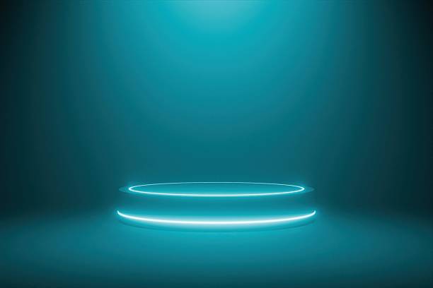 istock Futuristic glowing blue product podium with neon light on a dark background 2249496944