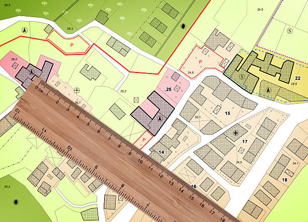 istock Land plot management - real estate concept with a vacant land available for building construction in a residential area against an imaginary cadastral map 2249500187