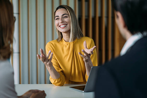 istock Group of business persons talking in the office. 2249500905