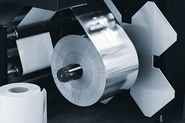 istock Automatic industrial machine for producing polyethylene bags or packaging products in plastic film. Automatic packaging products and food products concept 2249502308