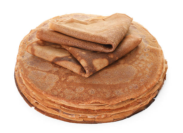 istock Stack of delicious chocolate crepes isolated on white 2249503168