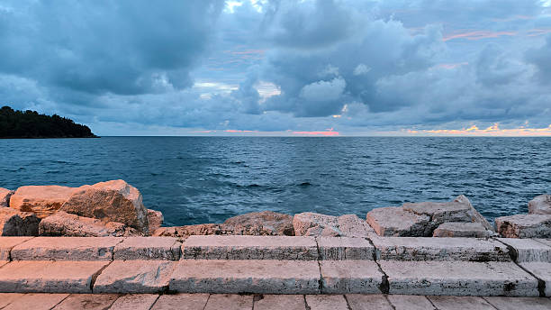 istock colorful sunset with clouds over the Adriatic Sea 2249503173